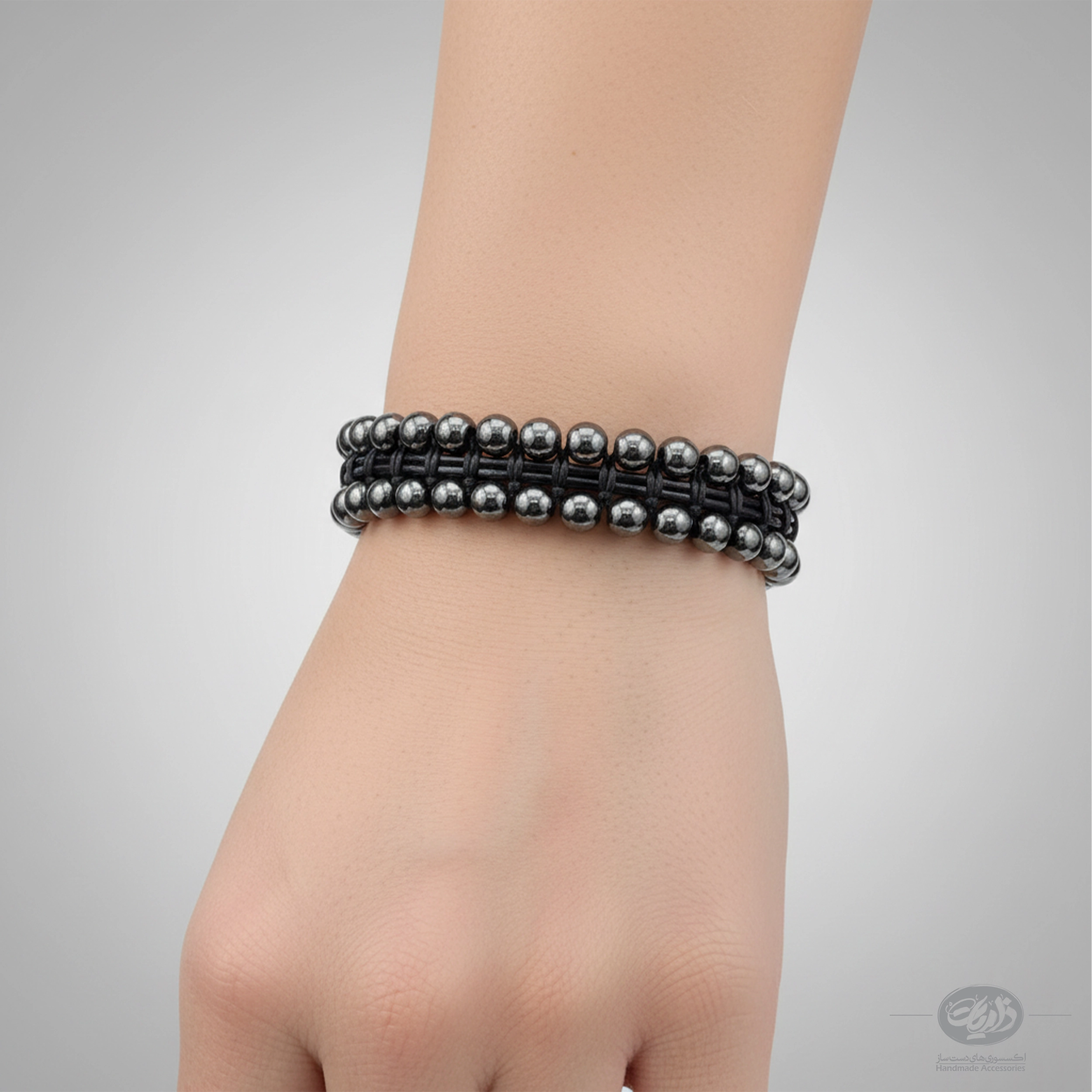 دستبند خاکستر (KHAKESTAR) 1 دستبند سنگ هماتیت و چرم طبیعی ذاریات مدل خاکستر (KHAKESTAR) - تصویر 1